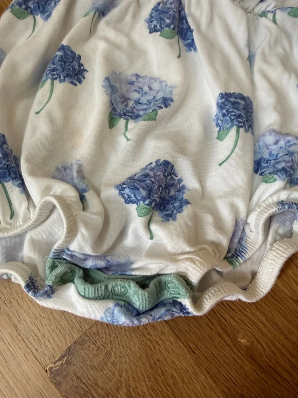 Kyte BABY White Romper with Blue Hydrangea Print and Mint Trim